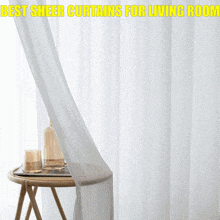 a hand is holding a white curtain with the words best sheer curtains for living room written above it