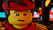 a close up of a lego character making a face