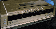a vhs recorder with the letter b on it