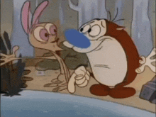 ren and ren from the ren and ren cartoon are standing next to each other