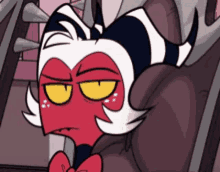 a red and white cartoon character with horns and a bow tie is sitting in a car .