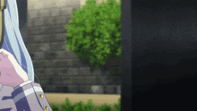 a girl with blue hair is standing in front of a brick wall with a bush in the background
