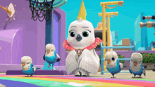 a group of cartoon birds are standing on a rainbow colored floor .