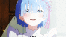 a close up of a girl with blue hair and a flower in her hair