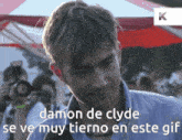 a gif of a man with the words damon de clyde on it