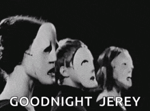 a group of people wearing masks are standing next to each other .