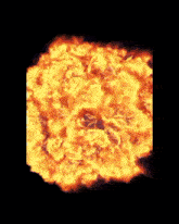 a large explosion of fire is going off in the dark