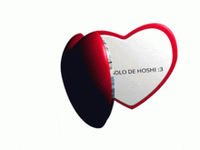 a heart shaped mirror with a picture of a man and the words korai solo de hoshi on it