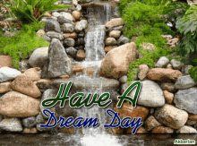 a picture of a waterfall with the words have a dream day below it