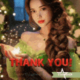 a woman in a green dress is holding a butterfly and says thank you in red letters