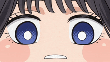 a close up of a girl 's blue eyes with white circles