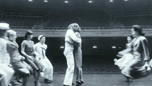 Hugging Leonard Bernstein GIF - Hugging Leonard Bernstein Felicia Montealegre GIFs