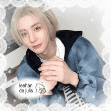 a picture of leehan de julis is framed with lace