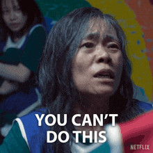 a woman is crying and says you can 't do this .