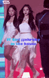 a woman in a white dress with the words " it girl jinkruby in the house " written on it