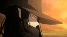 a close up of a person wearing a hat and a scarf