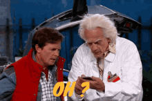 back to the future characters looking at a cell phone with the word oh on the bottom