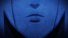 a close up of a person 's teeth with a dark background