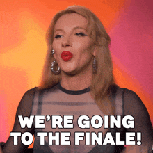 a woman with red lips is saying " we 're going to the finale "