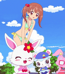 a girl in a bikini is standing on top of a white bunny