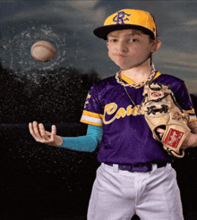 a baseball player wearing a purple case jersey