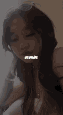 a girl with long hair is wearing sunglasses and has the word les servies written on her face