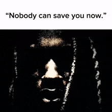 a black and white photo of a man with red eyes and the words " nobody can save you now "