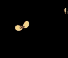a cartoon character with glowing eyes is standing in the dark with a black background .