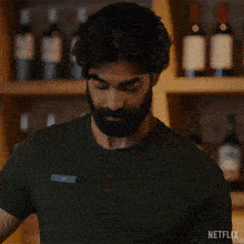 a man with a beard has a name tag that says joe