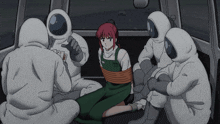 a group of astronauts are holding a girl tied up