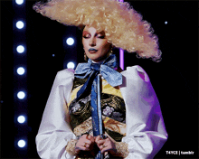 a picture of a woman with a wig and a caption that says t4yce