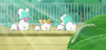 a green caterpillar is crawling on a green leaf in a cartoon