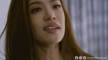 a close up of a woman 's face with the words ch7hd drama society visible