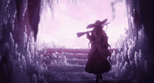 a woman is holding a gun in a cave