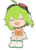 a girl with green hair is sitting down with her eyes closed and smiling