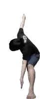 a person wearing a black shirt that says ' skull ' on the back