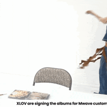 xlov are signing the albums for mwave custom and dancing
