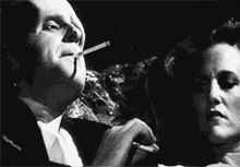 Smoke Cigarette GIF - Smoke Cigarette Black And White GIFs