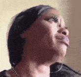 a close up of a woman making a funny face