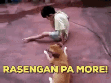 a man is sitting on the ground next to a dog that says " rasengan pa more " on the bottom