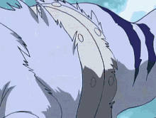 a close up of a cartoon character 's arm with a blue background .