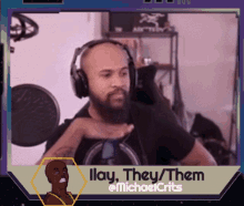a man wearing headphones with the words illay they them on the bottom