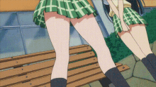 a couple of anime girls standing next to each other