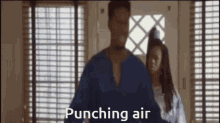 Punching Air GIF - Punching Air GIFs