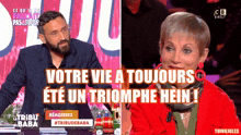 a man with a beard and a woman in a red jacket are on a c8 direct show