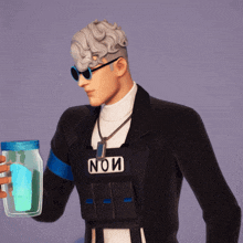 a man wearing sunglasses and a black vest with the word nom on it
