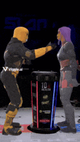 a man and a woman are standing in front of a 10x health display