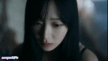 a close up of a woman 's face with the words nexpagifs below it