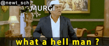 a man in a suit and white hat is saying what a hell man ?
