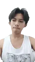 a young man wearing a white tank top with a palm tree on the front